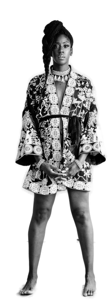 A black and white photo of a woman in a kimono.